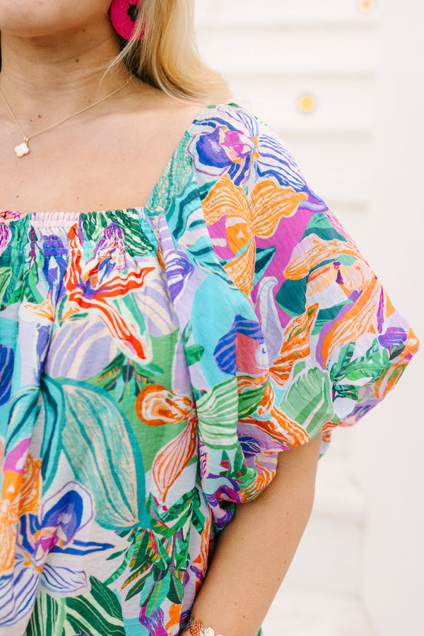 Plus Size lavender tropical abstract print top with a square neckline and puff sleeves.