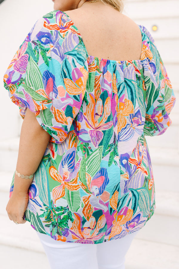 Plus Size lavender tropical abstract print top with a square neckline and puff sleeves.