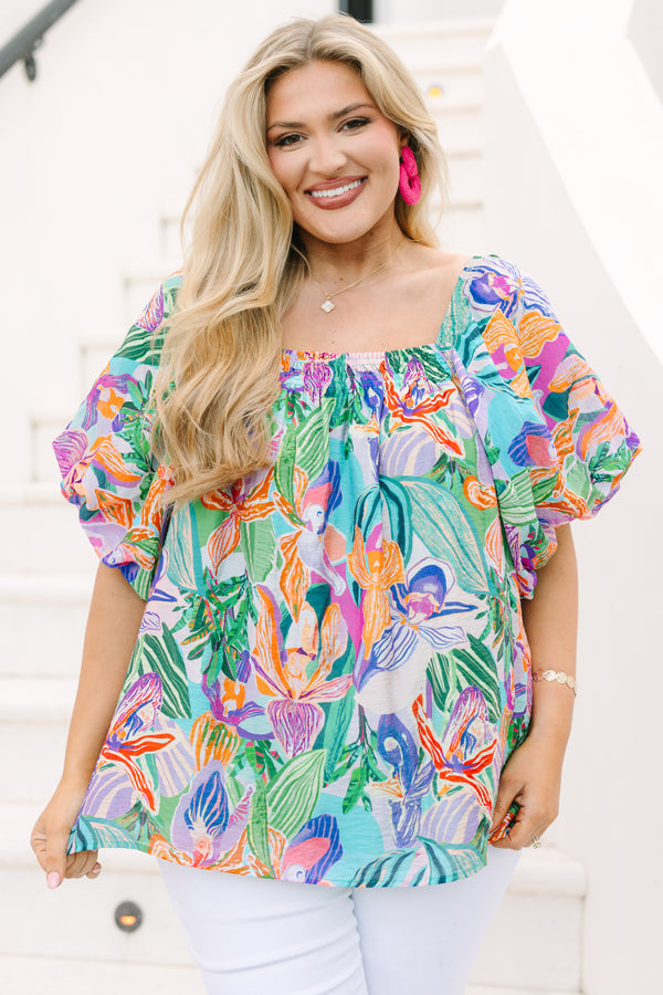 Plus Size lavender tropical abstract print top with a square neckline and puff sleeves.