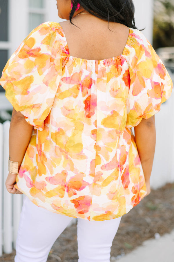 Chic Soul plus size clothing, yellow flowy top with a watercolor floral pattern along with bubble sleeves and as square neckline 
