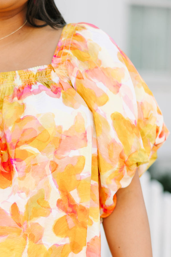 Chic Soul plus size clothing, yellow flowy top with a watercolor floral pattern along with bubble sleeves and as square neckline 