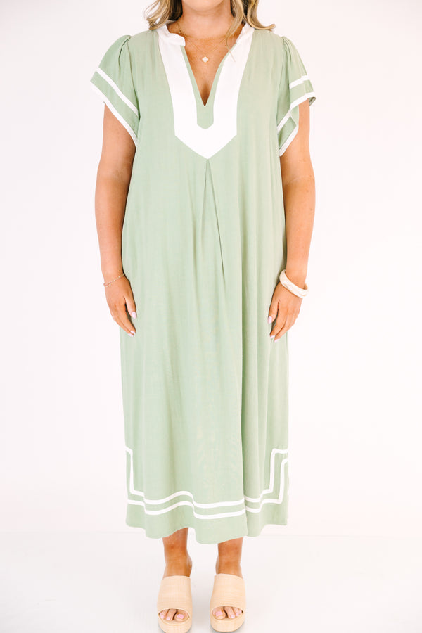 Chic Soul plus size clothing, sage maxi dress with white line designs outlining the bottom of the dress the end of the sleeves an a thick white strip outlining the v-neckline