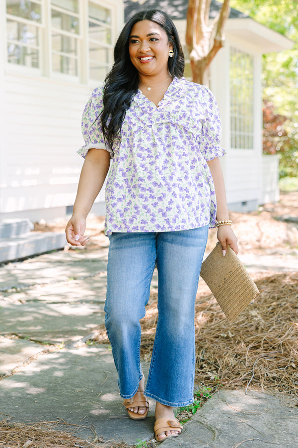 Plus Size purple floral print top with ruffled V-neckline and short puff sleeves.