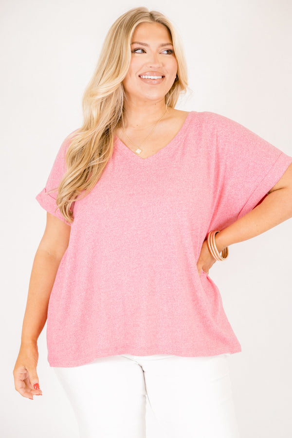 Plus Size heather kelly green crew neck cotton tee with cuffed short sleeves and white pants.