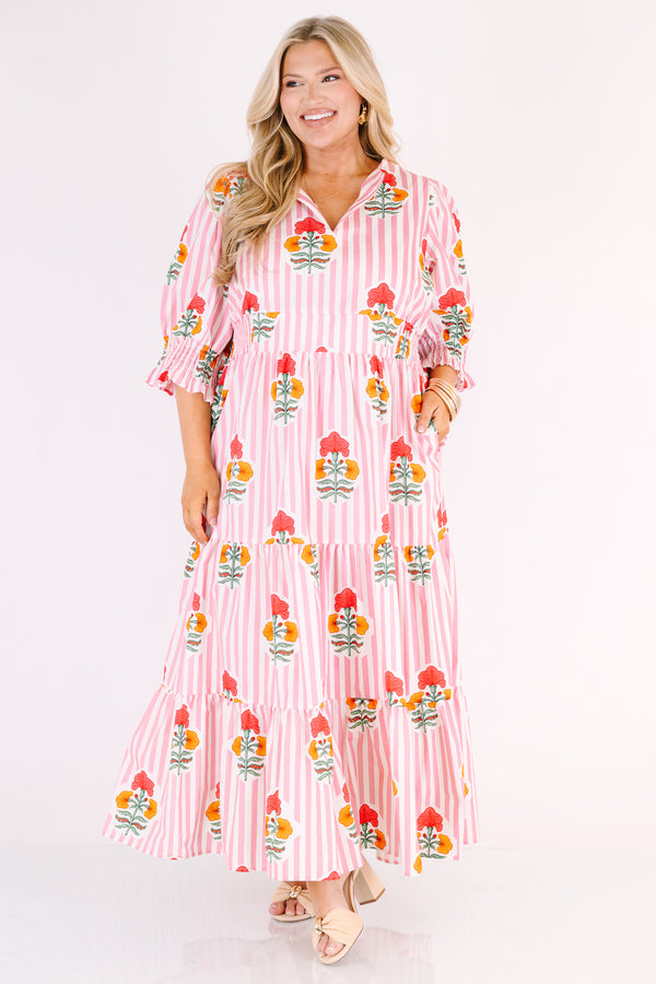 Chic Soul plus size clothing, orange striped maxi dress with half sleeves that have a ruffle flare out on the ends as well as a slight v-neckline and a floral block pattern throughout 