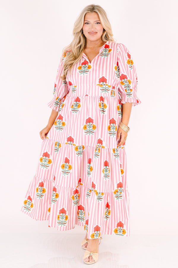 Chic Soul plus size clothing, orange striped maxi dress with half sleeves that have a ruffle flare out on the ends as well as a slight v-neckline and a floral block pattern throughout 