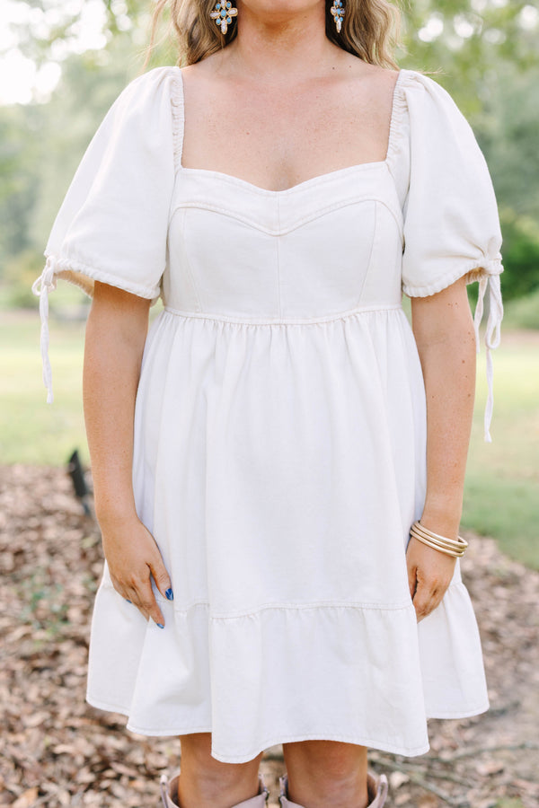 Plus Size cream denim mini dress with puff sleeves, a square neckline, and a tiered skirt.