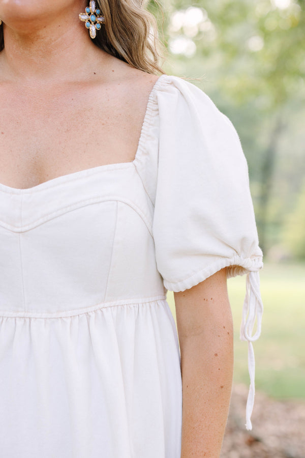 Plus Size cream denim mini dress with puff sleeves, a square neckline, and a tiered skirt.