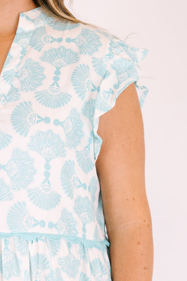 Chic Soul plus size clothing, white tiered midi dress with flutter sleeves a slight v-neckline and a turquoise abstract fan pattern throughout 
