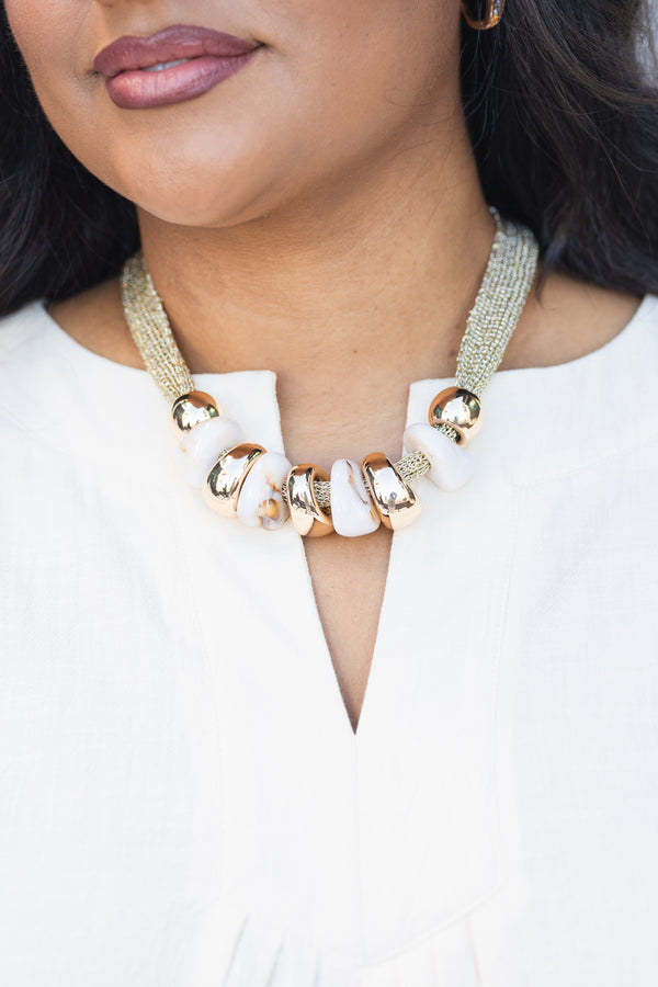 Chic Soul plus size clothing, gold necklace with gold and white marble beads attached to necklace 