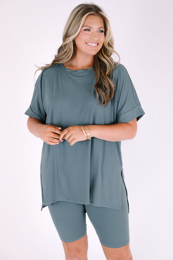 Plus Size ash jade short set with a round neck, high-low hem top and matching biker shorts.