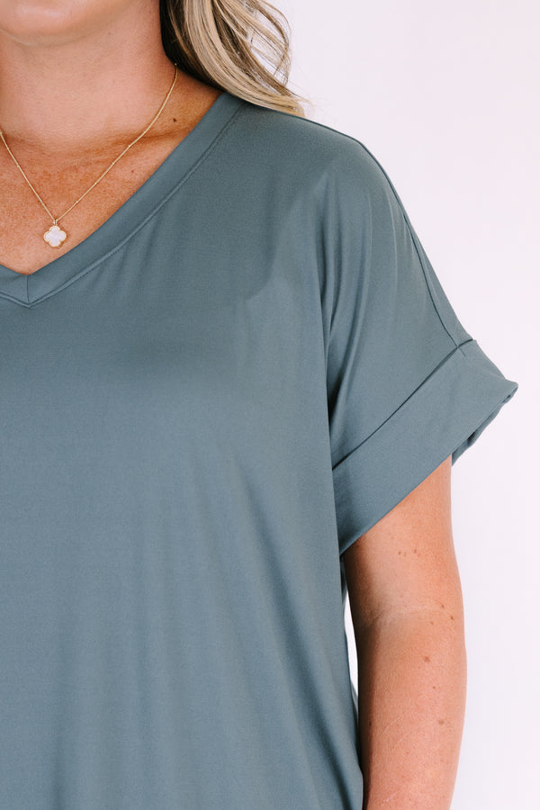 Plus Size ash jade v-neck dress with rolled short sleeves, a relaxed fit, and side pockets.