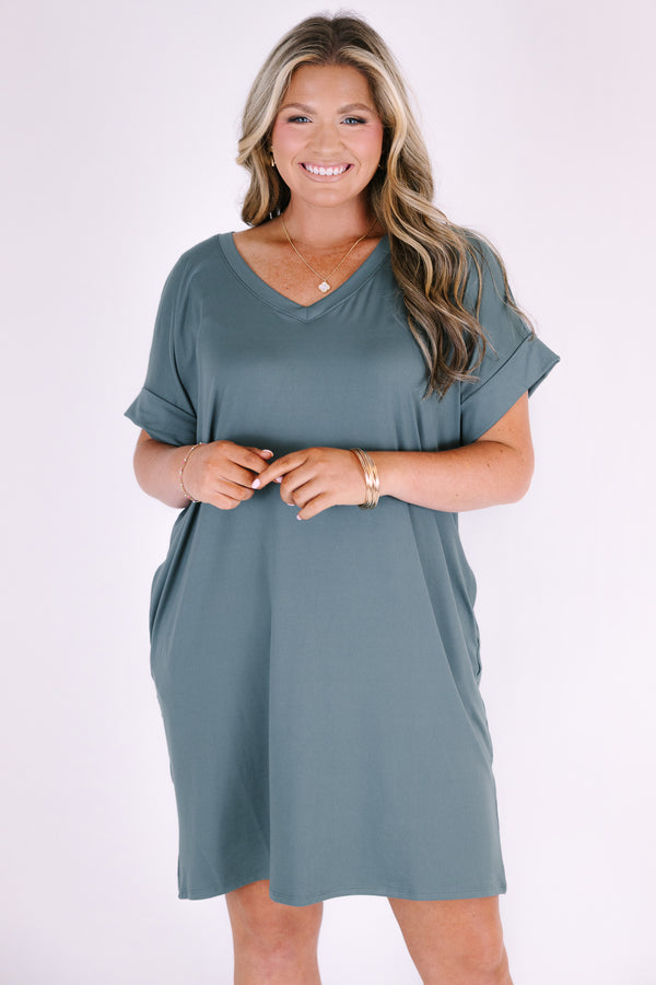 Plus Size ash jade v-neck dress with rolled short sleeves, a relaxed fit, and side pockets.