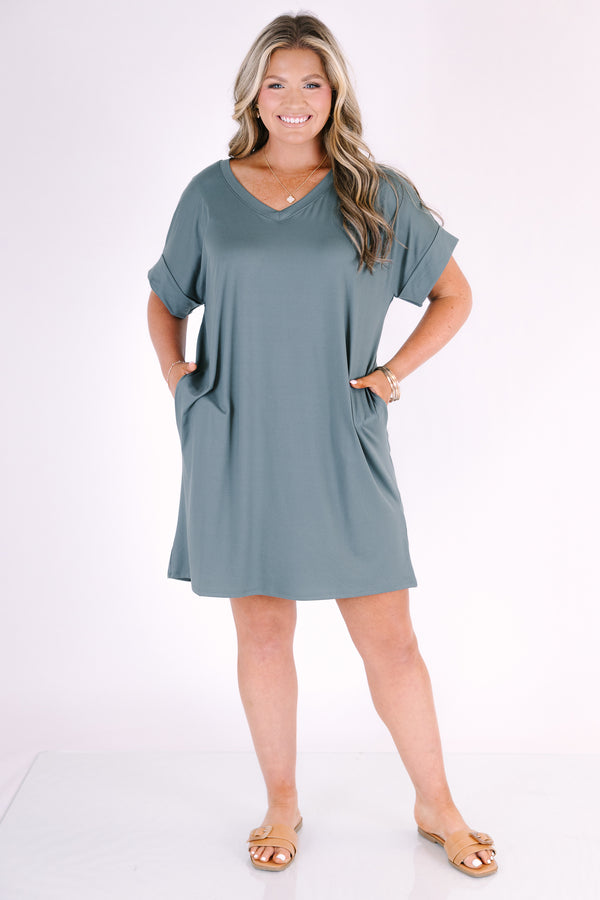 Plus Size ash jade v-neck dress with rolled short sleeves, a relaxed fit, and side pockets.