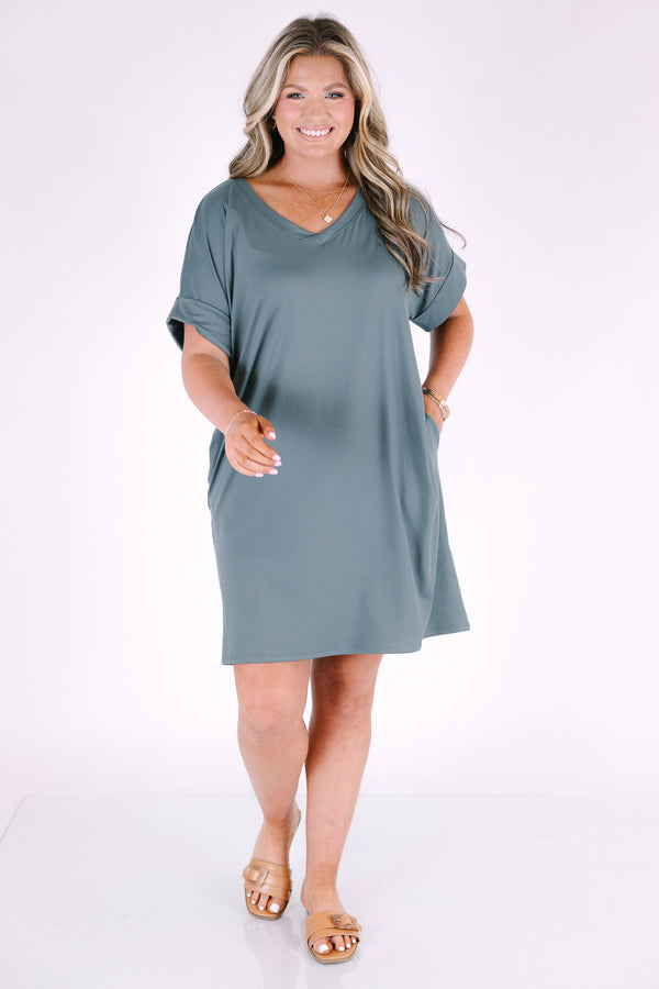 Plus Size ash jade v-neck dress with rolled short sleeves, a relaxed fit, and side pockets.