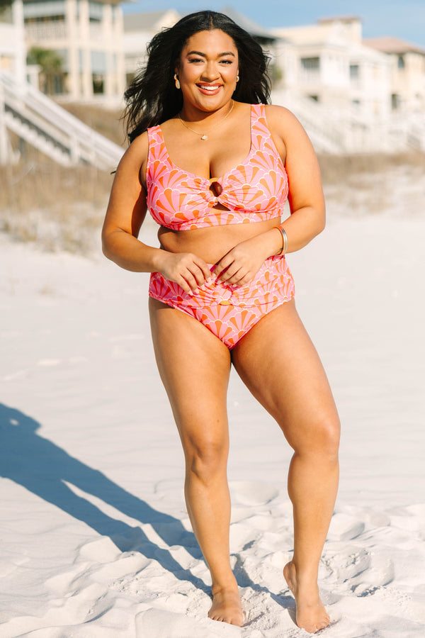 Chic Soul plus size clothing, pink and orange scallop geo print bikini bottoms with wrap waist meeting in the middle with a circular ring