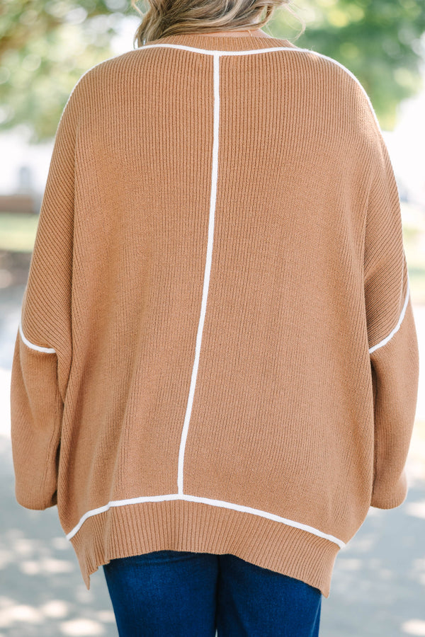 Plus Size brown oversized knit sweater with white contrast piping and a crew neckline.