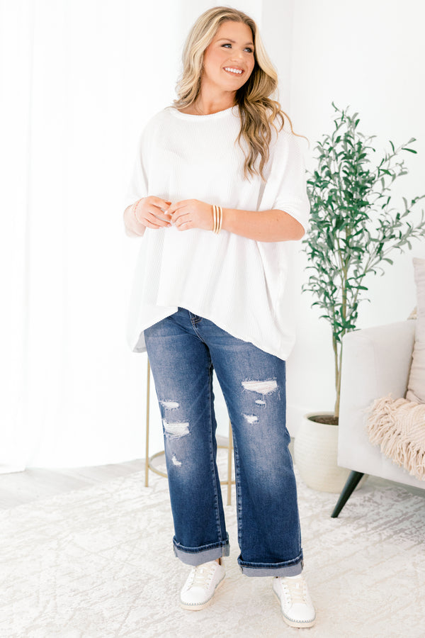 Chic Soul plus size clothing, dark wash straight leg blue jeans with small rips on and around the knee