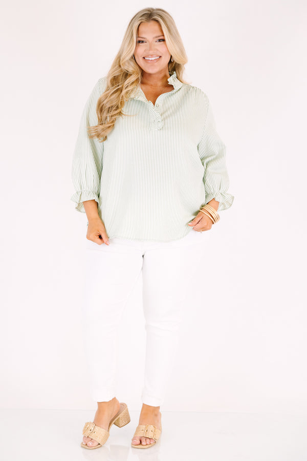 Chic Soul plus size clothing, green striped top with half sleeves that have ruffles at the end of each sleeve as well as ruffle detailing going along the collar and down the v-neckline