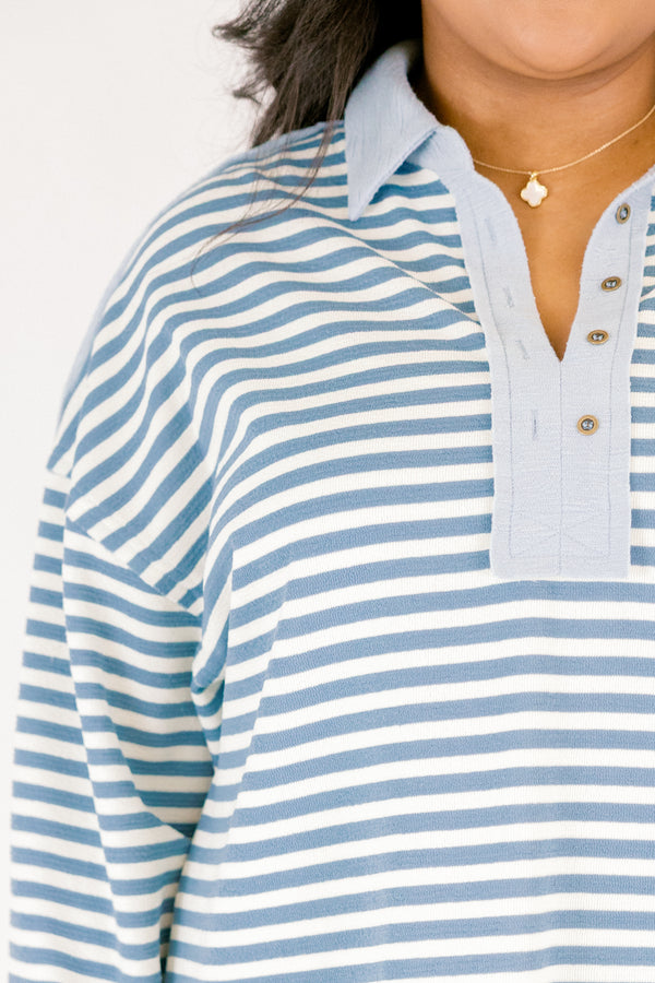 Chic Soul plus size clothing, blue striped pullover with long sleeves and a solid light blue stripe going along the v-neckline as well as buttons going down one side
