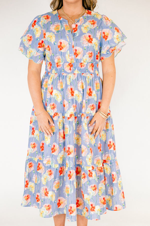 Chic Soul plus size clothing, blue tiered maxi dress with flutter sleeves that have two scalloped ruffle as well as sinching waistband a slight v-neckline and multi color flora pattern throughout 
