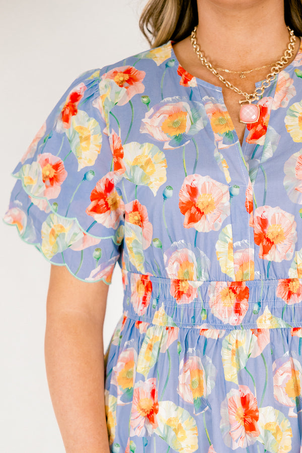 Chic Soul plus size clothing, blue tiered maxi dress with flutter sleeves that have two scalloped ruffle as well as sinching waistband a slight v-neckline and multi color flora pattern throughout 
