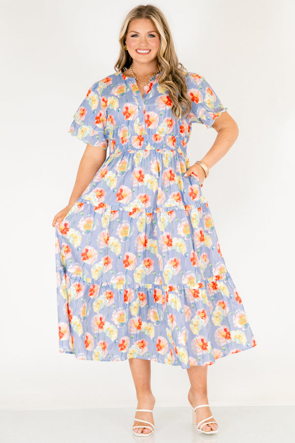 Chic Soul plus size clothing, blue tiered maxi dress with flutter sleeves that have two scalloped ruffle as well as sinching waistband a slight v-neckline and multi color flora pattern throughout 
