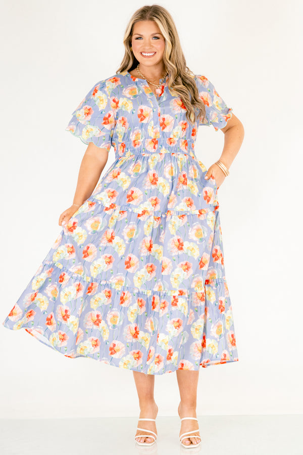 Chic Soul plus size clothing, blue tiered maxi dress with flutter sleeves that have two scalloped ruffle as well as sinching waistband a slight v-neckline and multi color flora pattern throughout 
