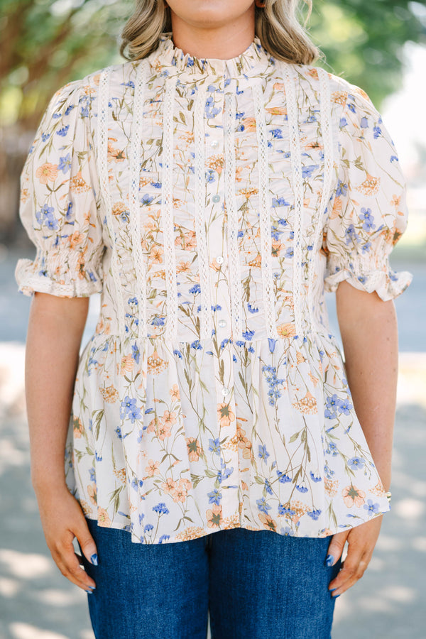 Plus Size cream floral top with puff sleeves, lace trim, and a high ruffled neckline.