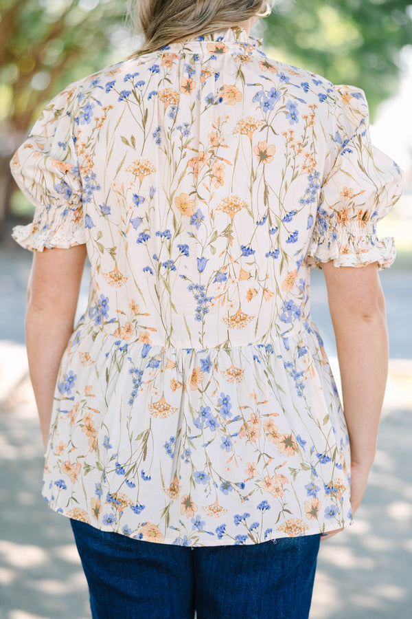 Plus Size cream floral top with puff sleeves, lace trim, and a high ruffled neckline.