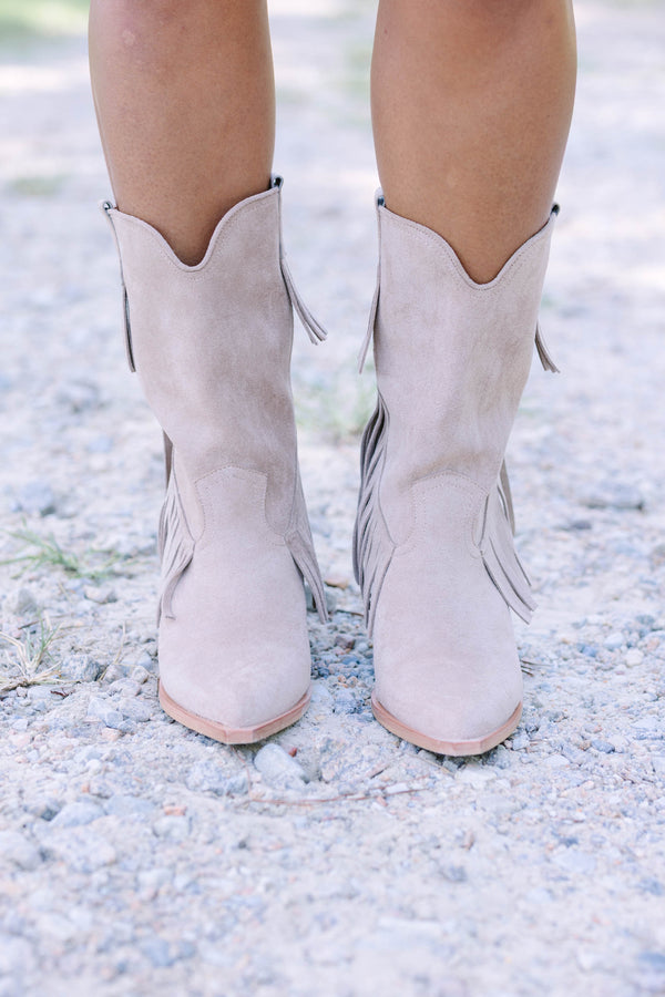 Plus Size beige suede pointed-toe ankle boots with long fringe detailing and a stacked heel.