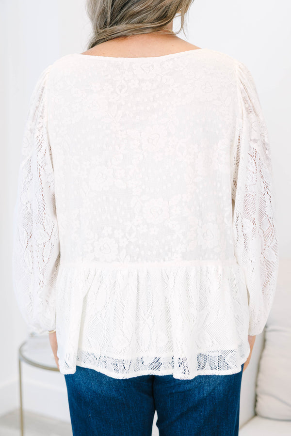 Plus Size cream lace top with long balloon sleeves, a V-neckline, and tie details.
