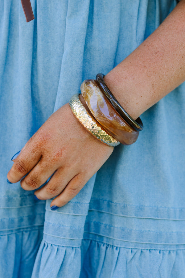 Plus Size set of three bangles in hammered gold, marbled amber resin, and dark brown wood.