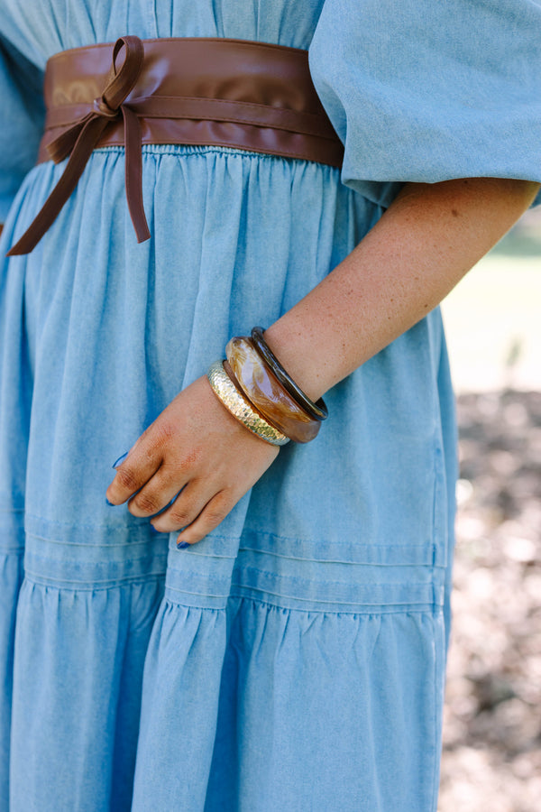 Plus Size set of three bangles in hammered gold, marbled amber resin, and dark brown wood.
