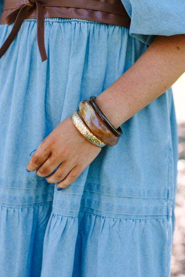 Plus Size set of three bangles in hammered gold, marbled amber resin, and dark brown wood.