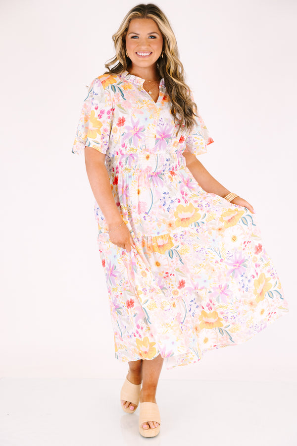 Chic Soul plus size clothing, white maxi dress with short sleeves a cinched waist a slight v-neckline and a multi-color floral pattern throughout 