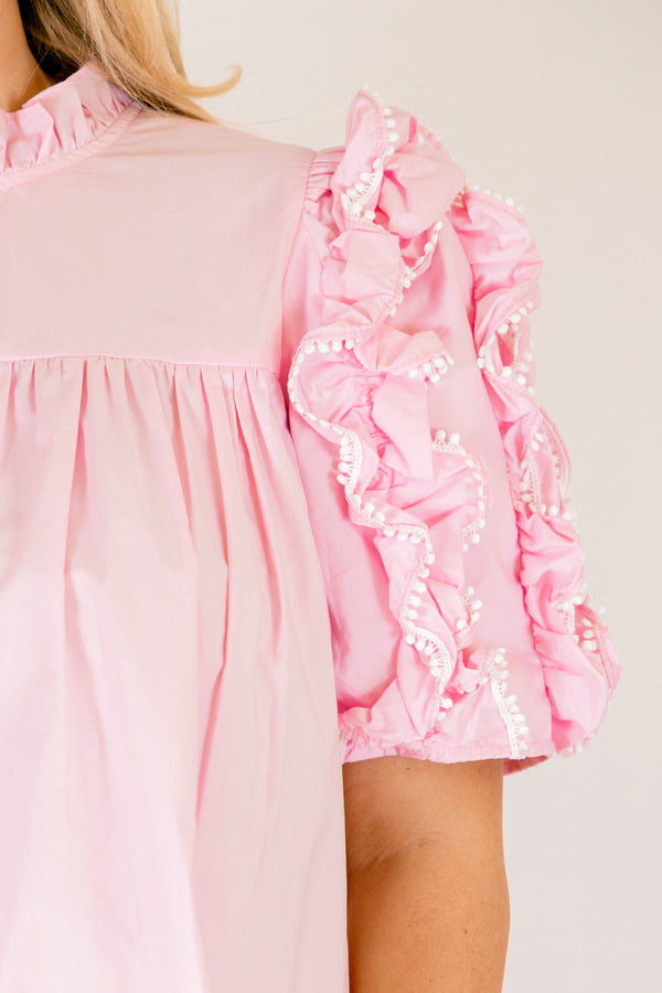 Chic Soul plus size clothing, light pink top with short sleeves that have ruffle detailing throughout the sleeve as well as a small ruffled collar 