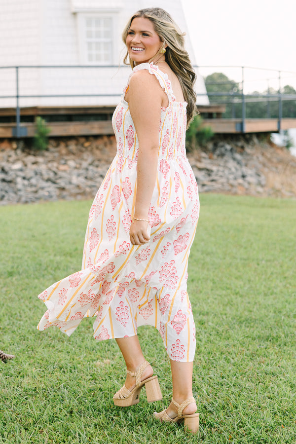 Plus Size white midi dress with pink block print patterns, yellow stripes, and a smocked bodice.