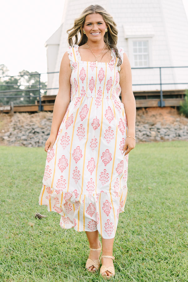 Plus Size white midi dress with pink block print patterns, yellow stripes, and a smocked bodice.