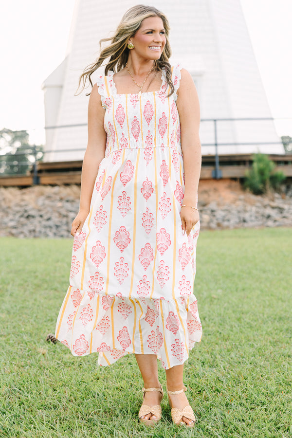 Plus Size white midi dress with pink block print patterns, yellow stripes, and a smocked bodice.