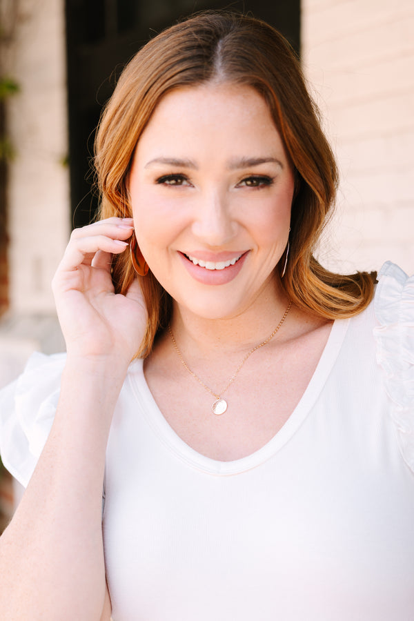 Chic Soul plus size clothing, gold necklace with a a distressed metal circle charm hanging off the center of the necklace 