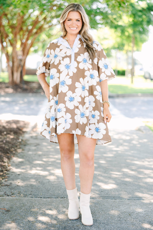 Plus size Human Nature Dress in brown with a white floral print, flowy fit, and collared neckline.