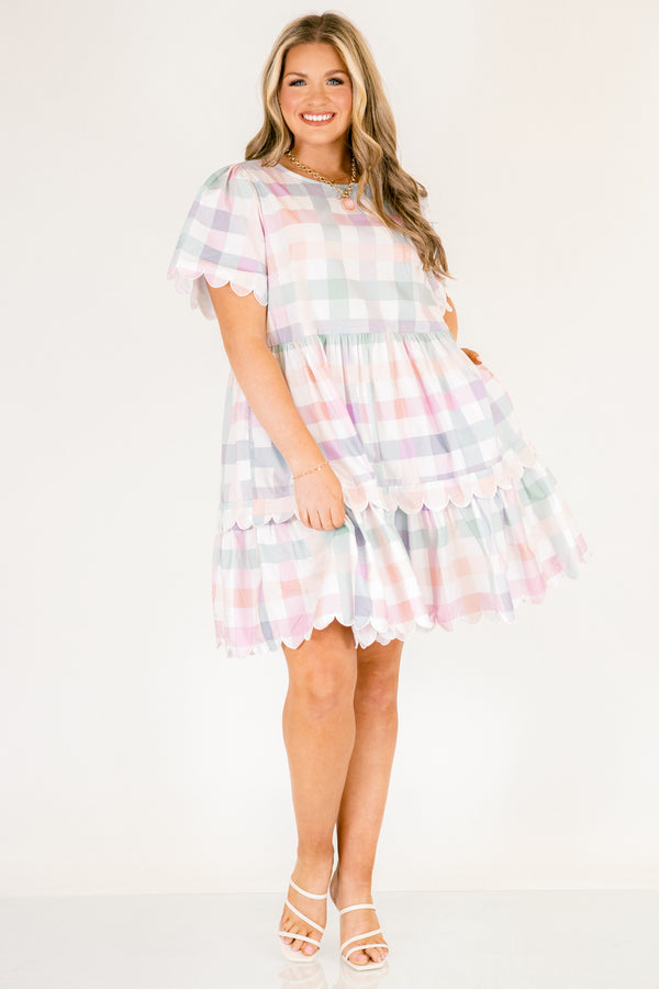 Chic Soul plus size clothing, pastel plaid knee length dress that has two tiers that both have a scalloped ruffle detail at the bottom of each tier scalloped detailing at the end of each sleeve