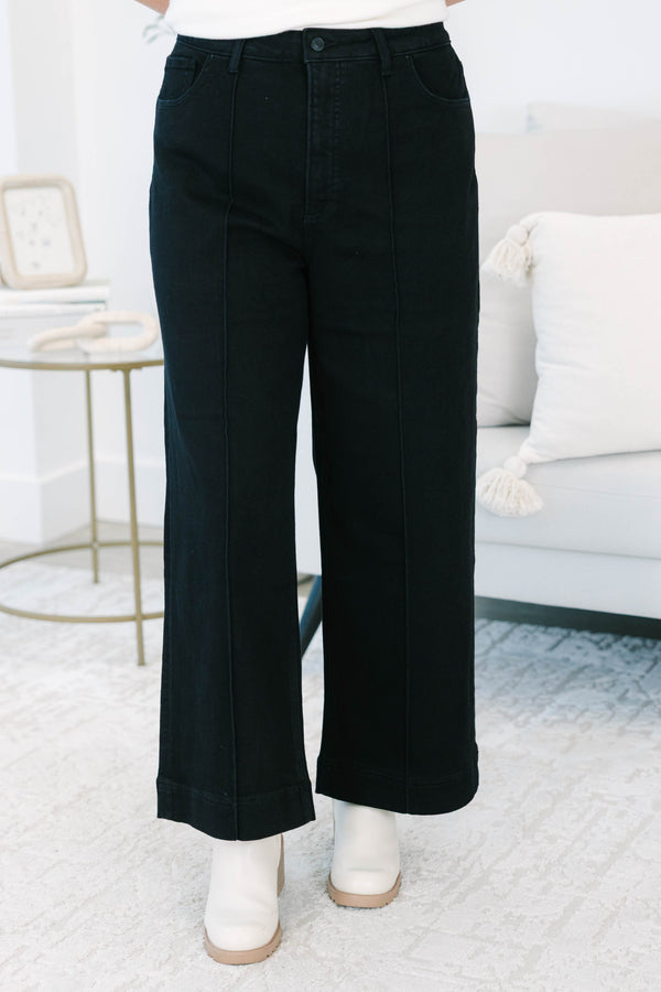 Plus size black wide leg jeans with front seam detail and a comfortable high-waisted fit.