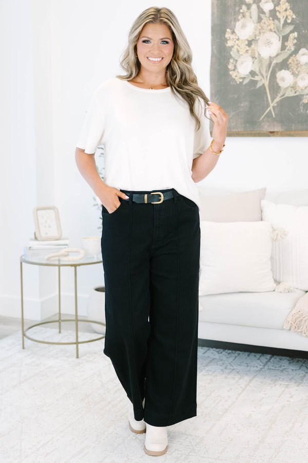 Plus size black wide leg jeans with front seam detail and a comfortable high-waisted fit.