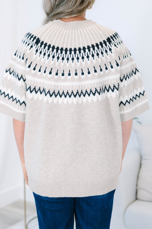 Plus size taupe short-sleeve sweater with a charcoal and white Fair Isle geometric yoke pattern.