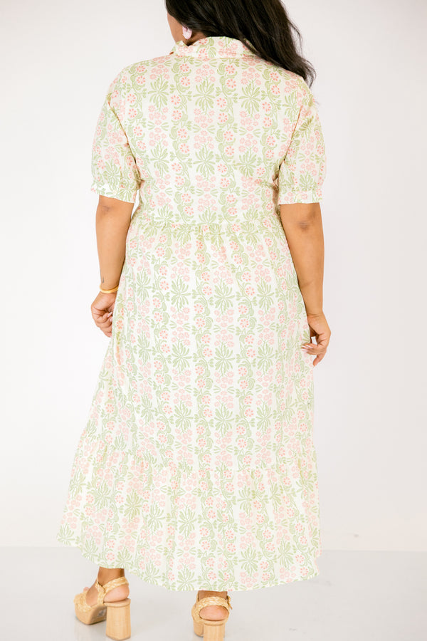 Chic Soul plus size clothing,  pink floral button up maxi dress with short sleeves that have cuffs at each end as well as a collar and a pink and green floral pattern throughout
