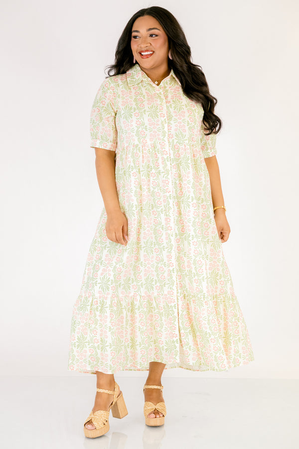 Chic Soul plus size clothing,  pink floral button up maxi dress with short sleeves that have cuffs at each end as well as a collar and a pink and green floral pattern throughout
