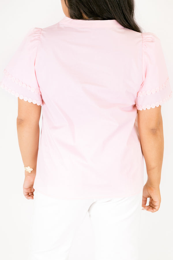 Chic Soul plus size clothing, pink top with flutter sleeves and circle scalloped detailing on the flutter sleeves v-neckline and going down the center of the shirt 