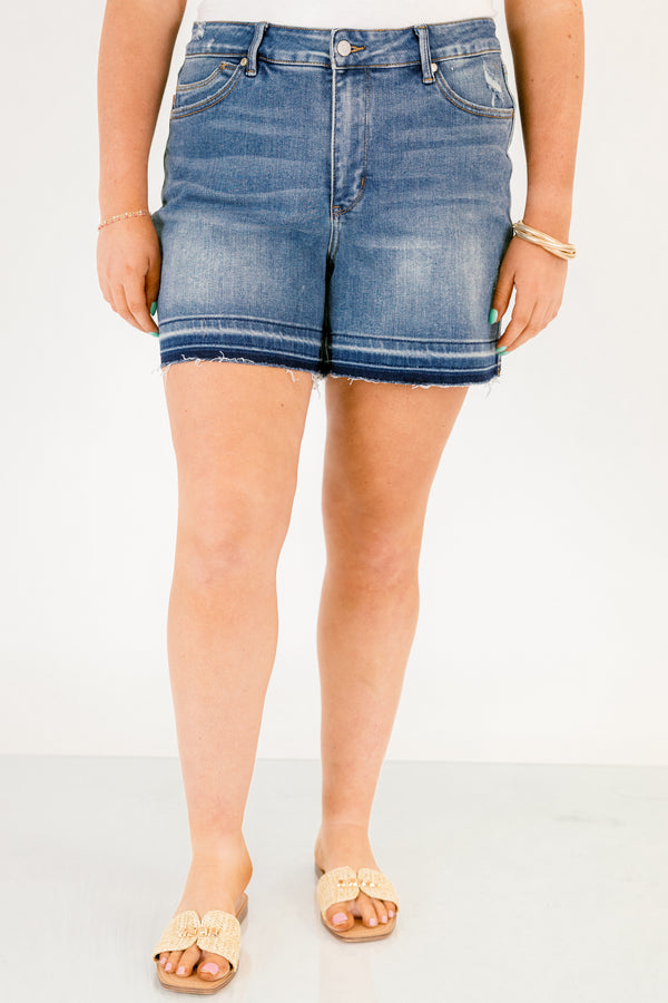 Chic Soul plus size clothing, dark washed jean shorts with front pockets and a distressed look as well as fringe details on the bottom of each short leg